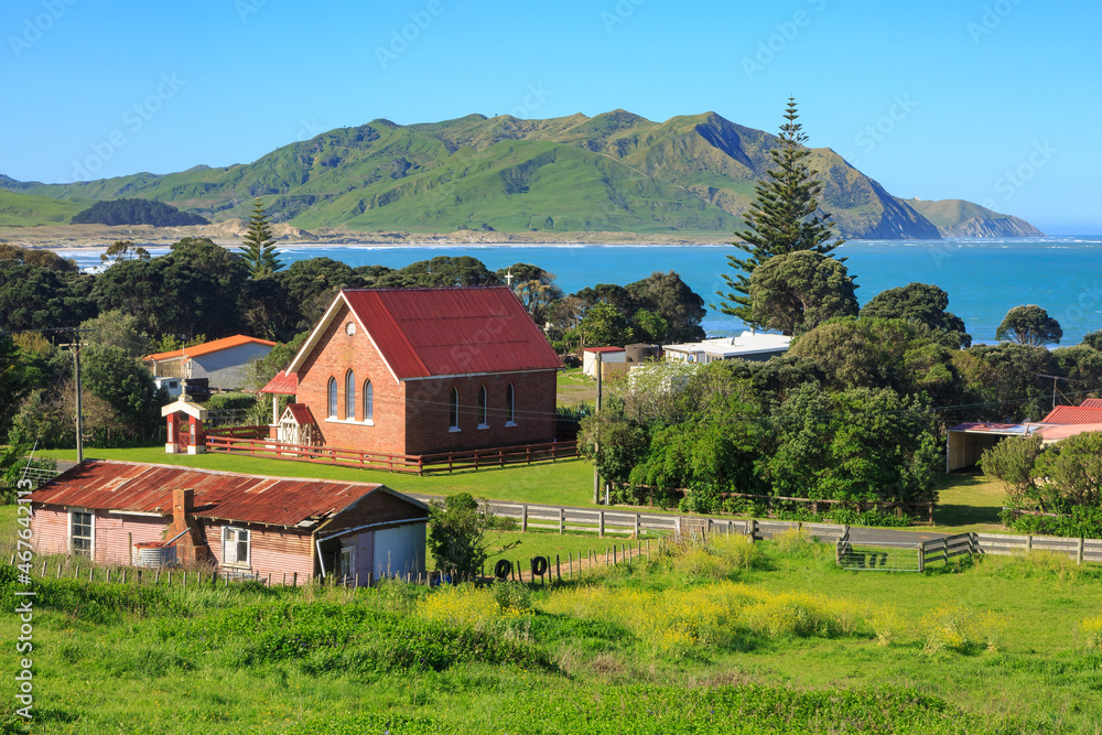 The small village of Whangara in the Gisborne region, New Zealand. The historic Patoromu Church is at center left