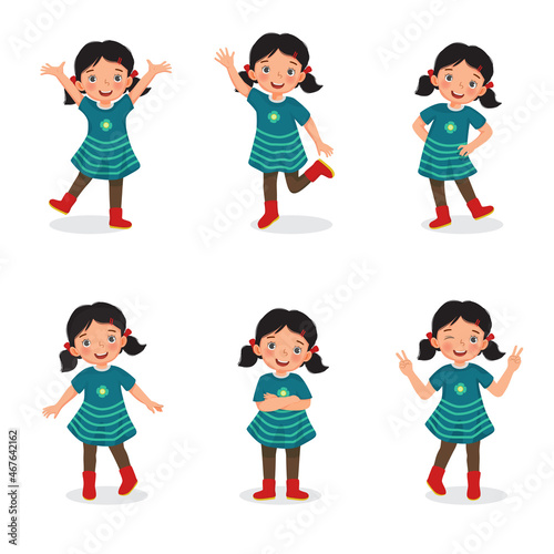 Set of vector of happy little girls with different action poses, hand gestures and legs positions, such as peace sign, wink eye, arm crossed, raising hands, hand on the waist, standing with one leg.