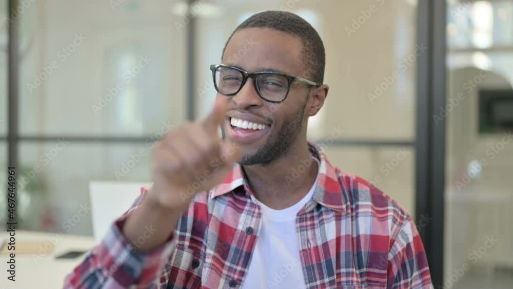 Portrait of African Man Pointing at the Camera Portrait of African Man Pointing at the Camera