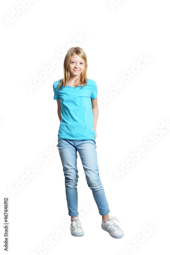Full length portrait of cute girl in casual clothing posing isolated