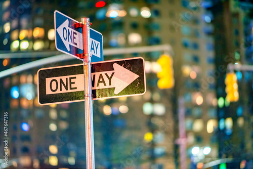 One way signs at night in New York City - Manhattan.