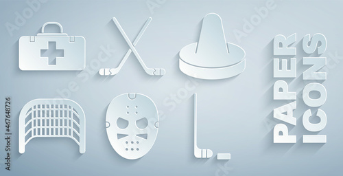 Set Hockey mask, Mallet for playing air hockey, Ice goal, stick and puck, sticks and First aid kit icon. Vector