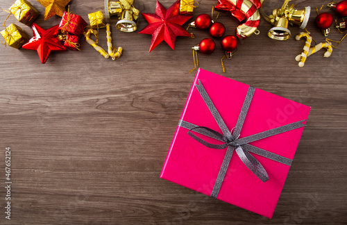 Christmas composition. Christmas gifts, decorations on wooden background. Flat lay