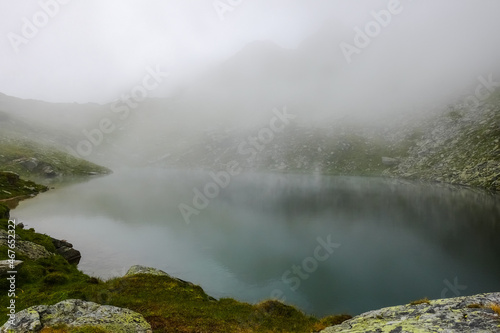 wonderful clear mountain lake with the outlines from the mountain range