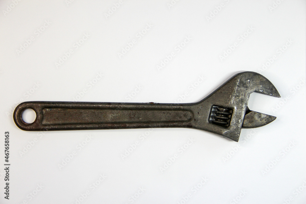 Adjustable wrench isolated on the white background Adjustable wrench isolated on the white background