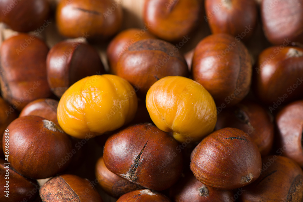 Close-up Chestnuts with peeled isolated on white background. Close-up Chestnuts with peeled isolated on white background.