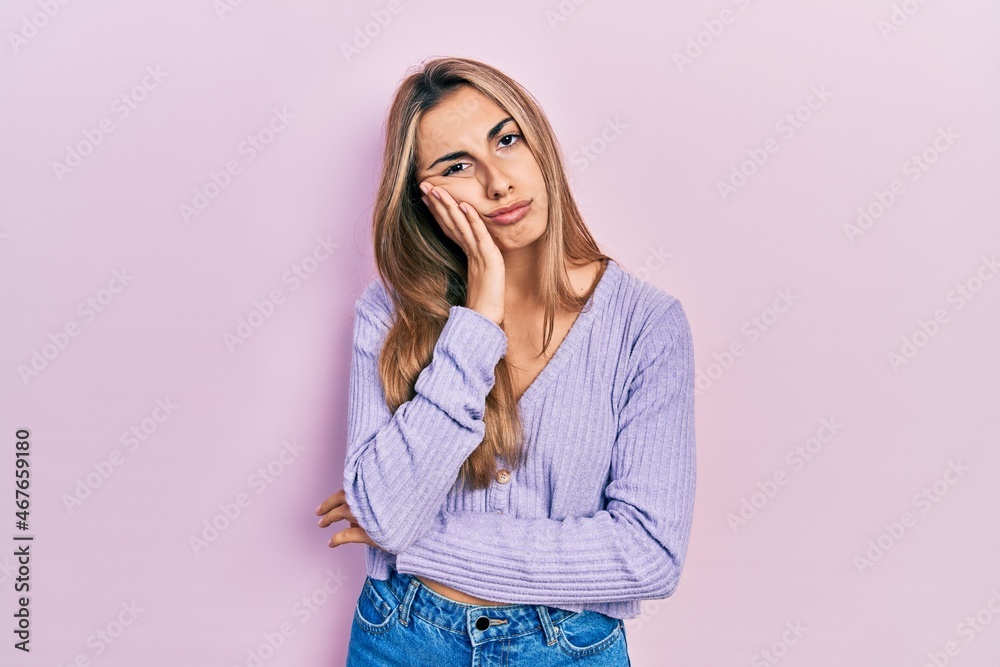 Beautiful hispanic woman wearing casual shirt thinking looking tired and bored with depression problems with crossed arms. Beautiful hispanic woman wearing casual shirt thinking looking tired and bored with depression problems with crossed arms.