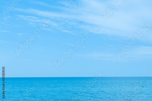 Open sea. Nature scenery. Peaceful beauty. Amazing glaze of blue water surface clear sky in sunny daylight. © golubovy