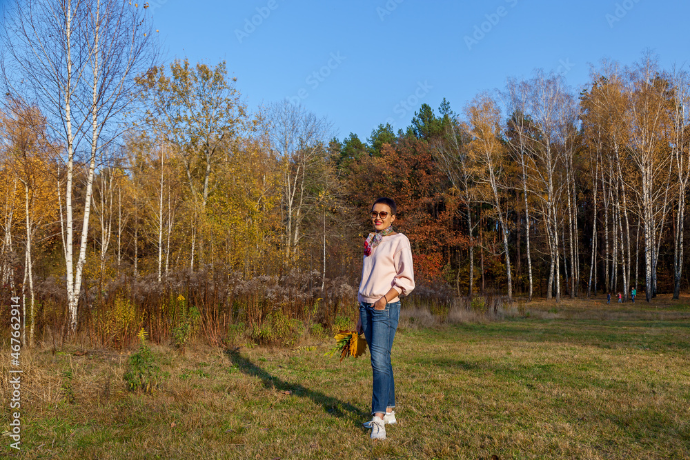 young woman in autumn forest young woman in autumn forest