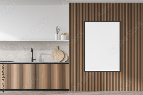 Wood and white kitchen with frame mockup on wall