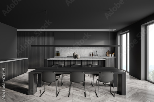 Dark grey kitchen space with lignear light