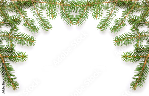Frame of fir branches on a white background. Christmas frames or borders with fir tree.