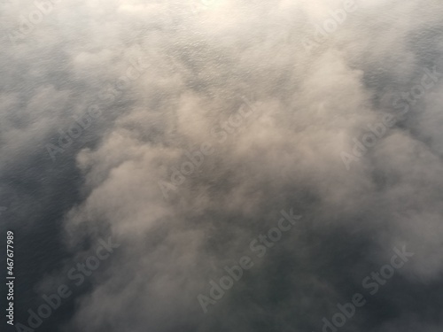 aerial view of fog above sea