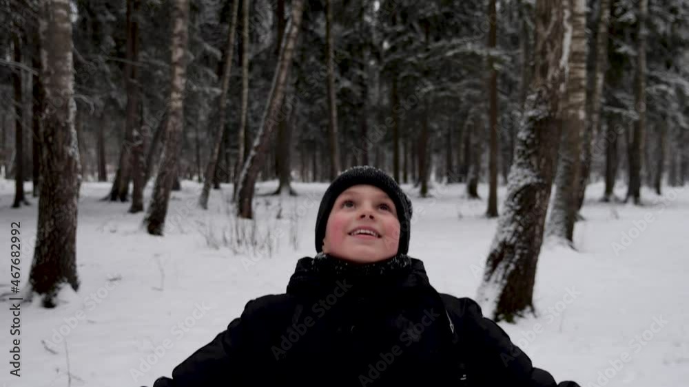 Happy Boy Lifting His Face To Feel The Snow Falling Happy Boy Lifting His Face To Feel The Snow Falling