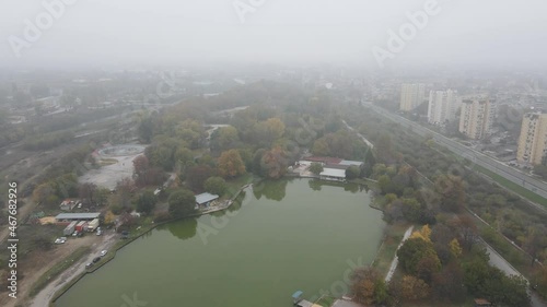 Amazing Aerial view of town of Pazardzhik, covered with fog,  Bulgaria photo