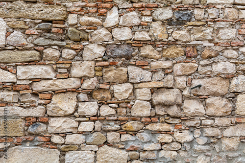 Old stone wall. Aged surface texture. Stone Background