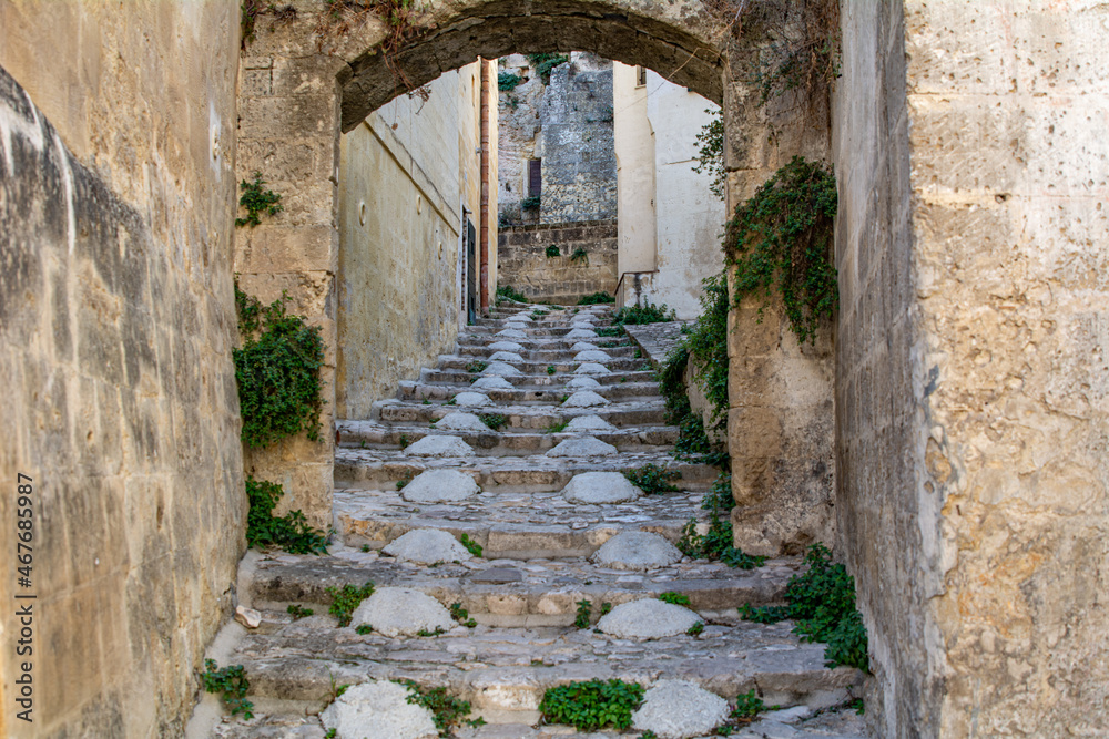 Narrow street in the historic City of Materia in southern Italy. Matera was in 2019 the European Capital of Culture