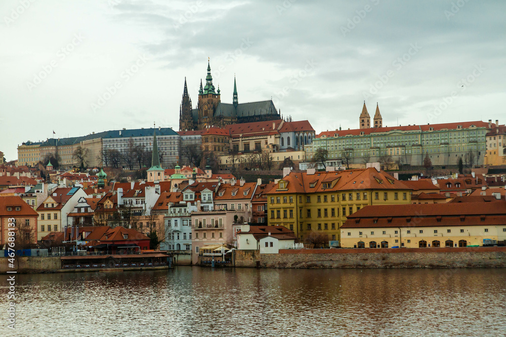 City castle and Charles bridge, Prague in cloudy weather