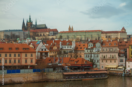 City castle and Charles bridge, Prague in cloudy weather