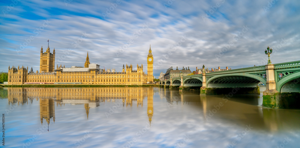 Big Ben and Westminster bridge wit reflection in London. England