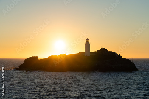 Godrevy lighthouse at sunset in Cornwall. United Kingdom © Pawel Pajor