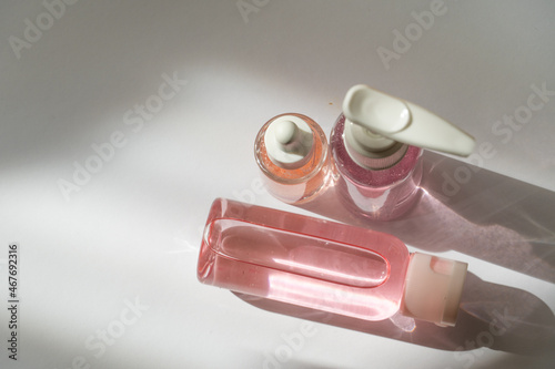 Pastel Skincare Bottle Floating in Minimalist Liquid Scene