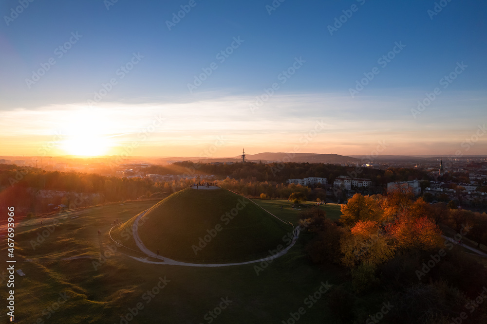 Obraz na płótnie Krakus Mound also called the Krak Mound in fall colors at sunset w salonie