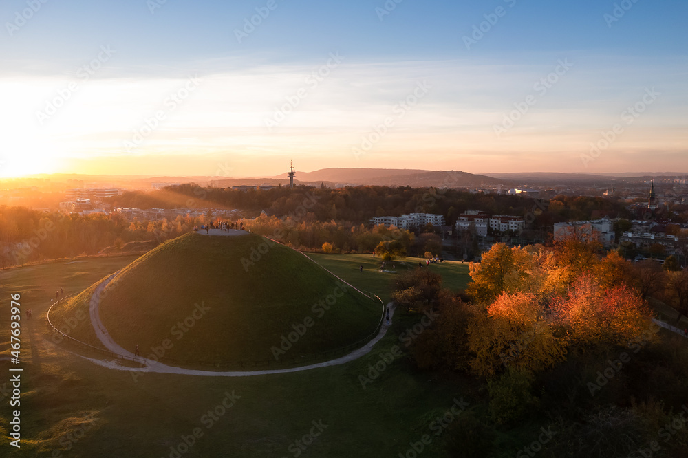 Krakus Mound also called the Krak Mound in fall colors at sunset - obrazy, fototapety, plakaty 