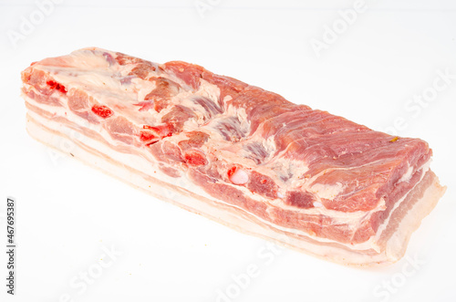 Piece of raw pork belly, fresh meat for cooking. Studio Photo