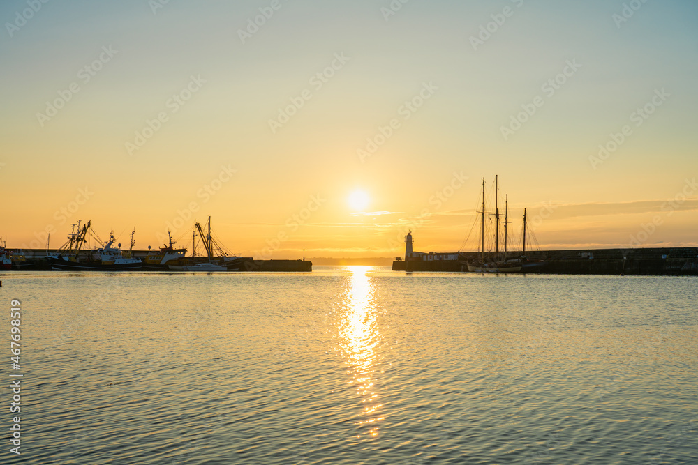 Newlyn town harbour at sunrise in Cornwall. United Kingdom