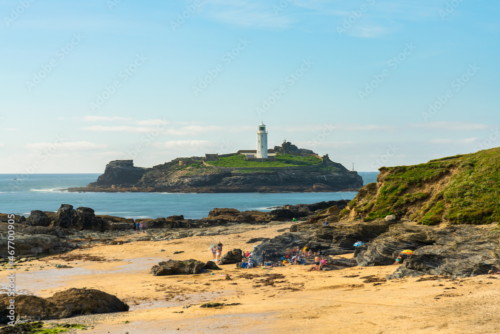 Gwithian Beach and Godrevy lighthouse in Cornwall. United Kingdom