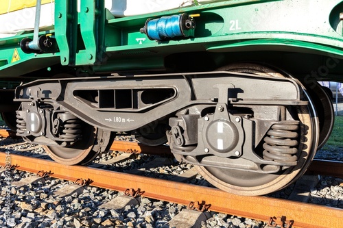 bogie of a freight car on railway track photo