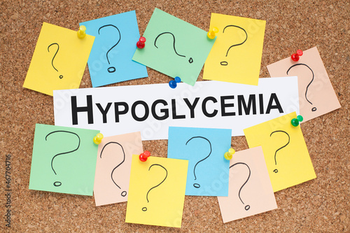 Hypoglycemia word concept on cork board photo