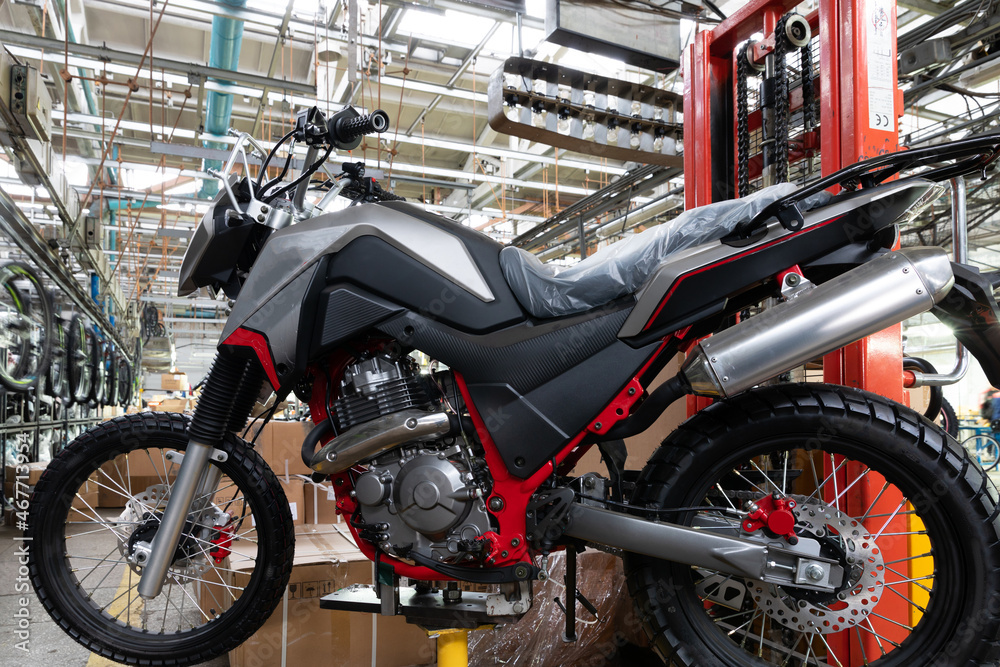 motorcycle factory, assembly line and conveyor