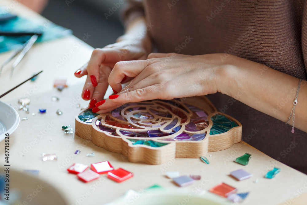 The process of creating a flower from a mosaic. The process of creating a flower from a mosaic.