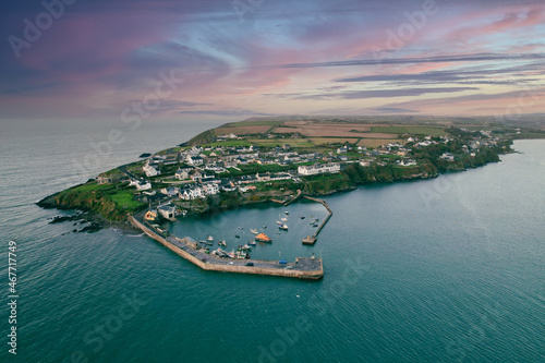Aerial view of Ballycotton, a coastal fishing  village in County Cork, Ireland, at sunrise on a calm autumn morning