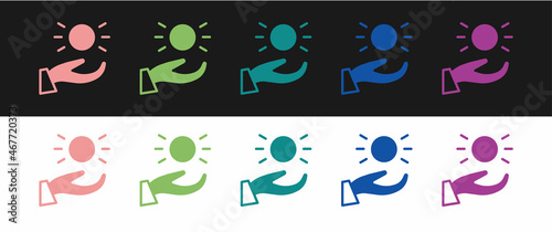 Set Ball levitating above hand icon isolated on black and white background. Levitation symbol. Vector