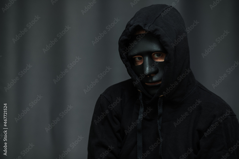 hacker in mask,cybersecurity,network protection from hacking