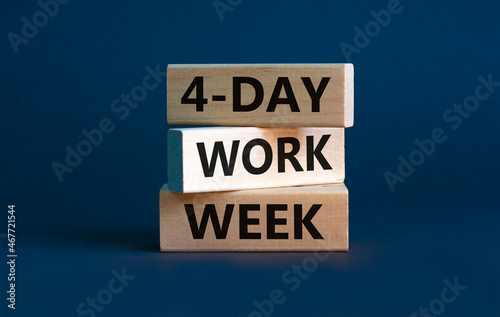 4-day work week symbol. Concept words '4-day work week' on wooden blocks. Beautiful grey background. Copy space. Business and 4-day work week concept. photo