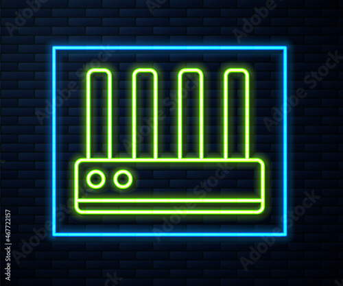 Glowing neon line Router and wi-fi signal icon isolated on brick wall background. Wireless ethernet modem router. Computer technology internet. Vector