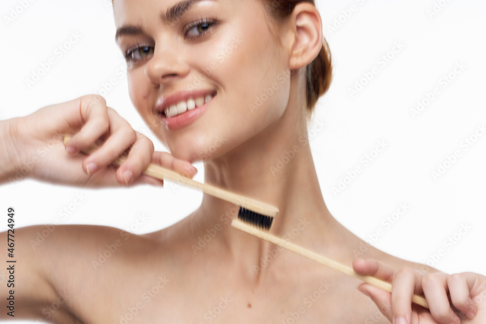 cheerful woman with bare shoulders toothbrushes hygiene oral care cheerful woman with bare shoulders toothbrushes hygiene oral care
