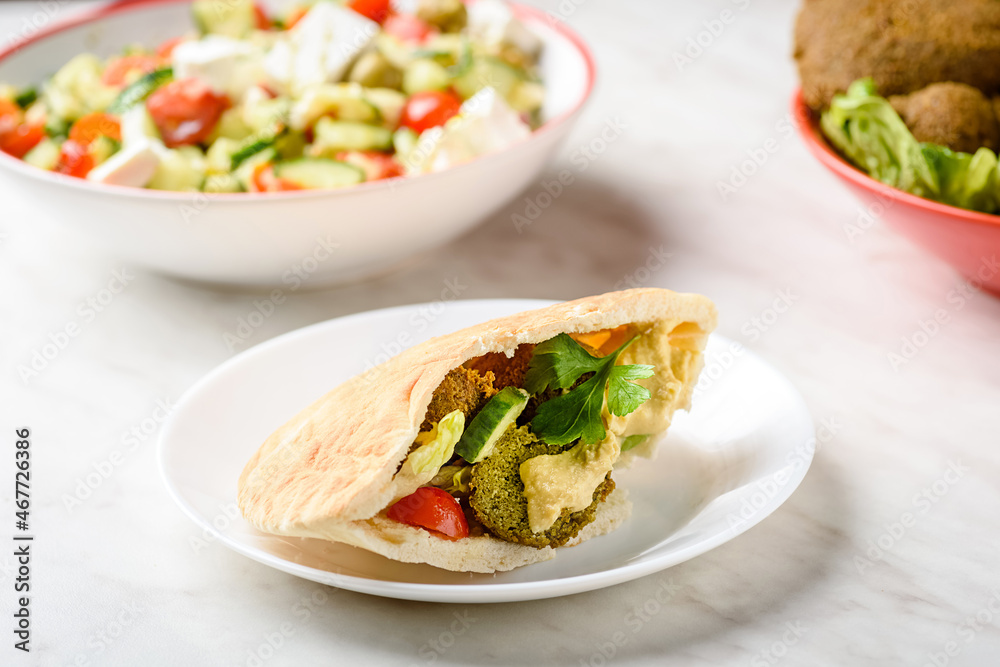 Falafel is a vegetarian dish of Mediterranean and Arabic cuisine Falafel is a vegetarian dish of Mediterranean and Arabic cuisine