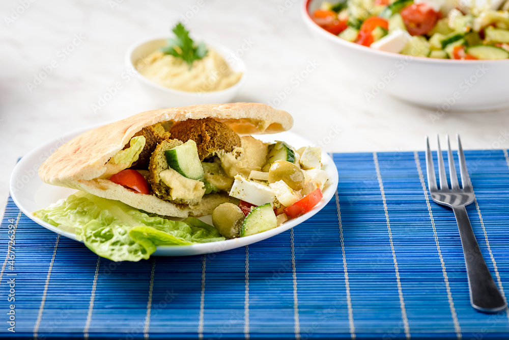 Falafel is a vegetarian dish of Mediterranean and Arabic cuisine Falafel is a vegetarian dish of Mediterranean and Arabic cuisine