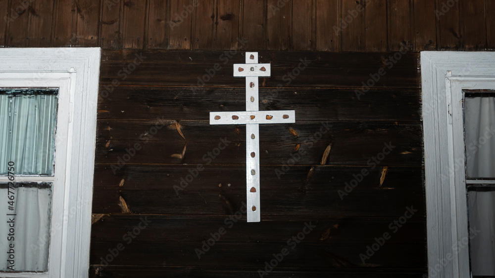 A large Christian crucifix. Faith in God. A symbol of Christianity. Worship concept.