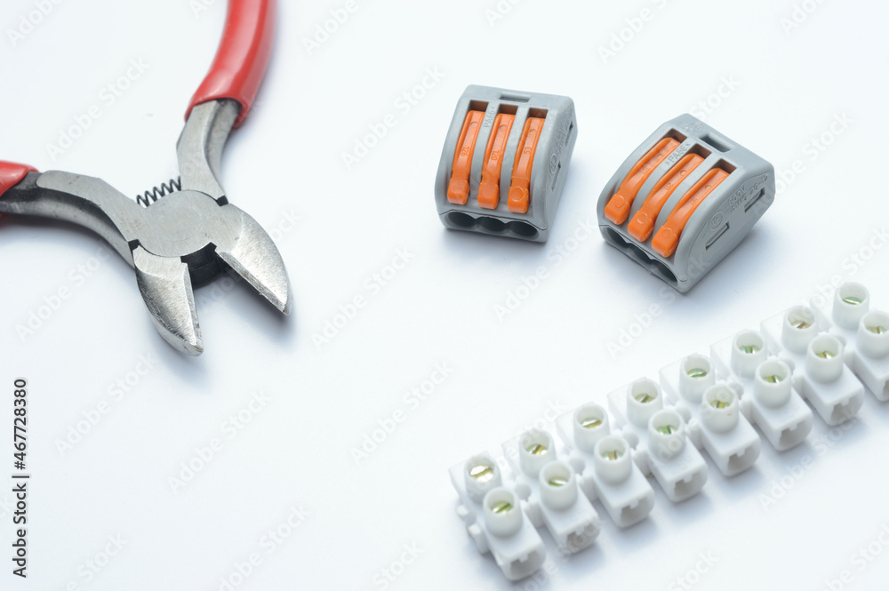 tools for electro repair on a light background. close-up. tools for electro repair on a light background. close-up.