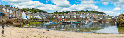 Mousehole harbour panorama near Penzance in Cornwall. United Kingdom