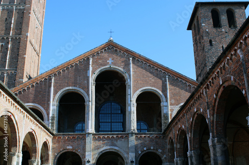 Facciata a capanna e quadriportico della basilica romanica di Sant'Ambrogio a Milano photo
