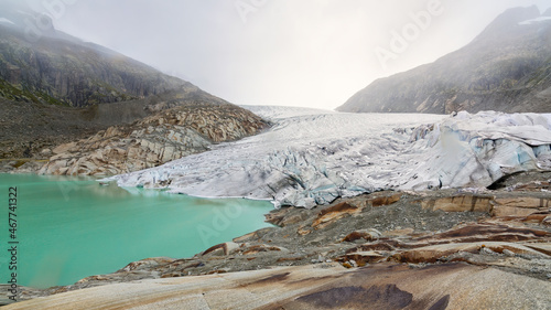 Great Rhone glacier melting water lake in canton of Valais, Switzerland.