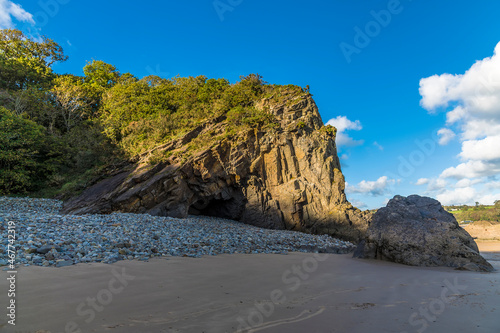 A view from Glen Beach towards a cliff anticline at Saundersfoot, South Wales on a sunny day photo