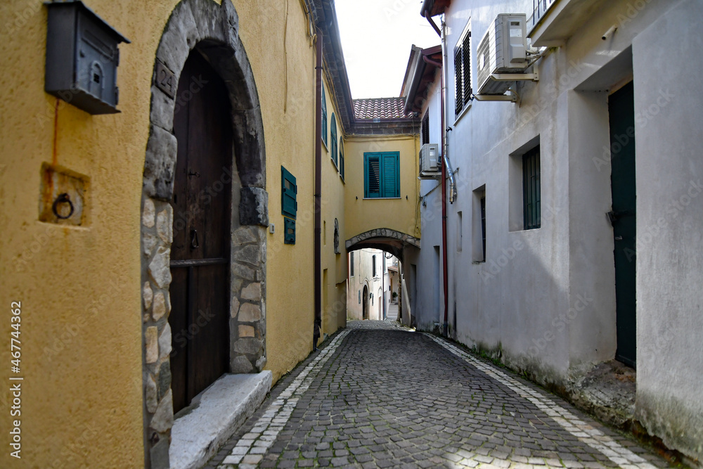 A narrow street in Castel di Sasso, a small village in the mountains of the province of Caserta, Italy.